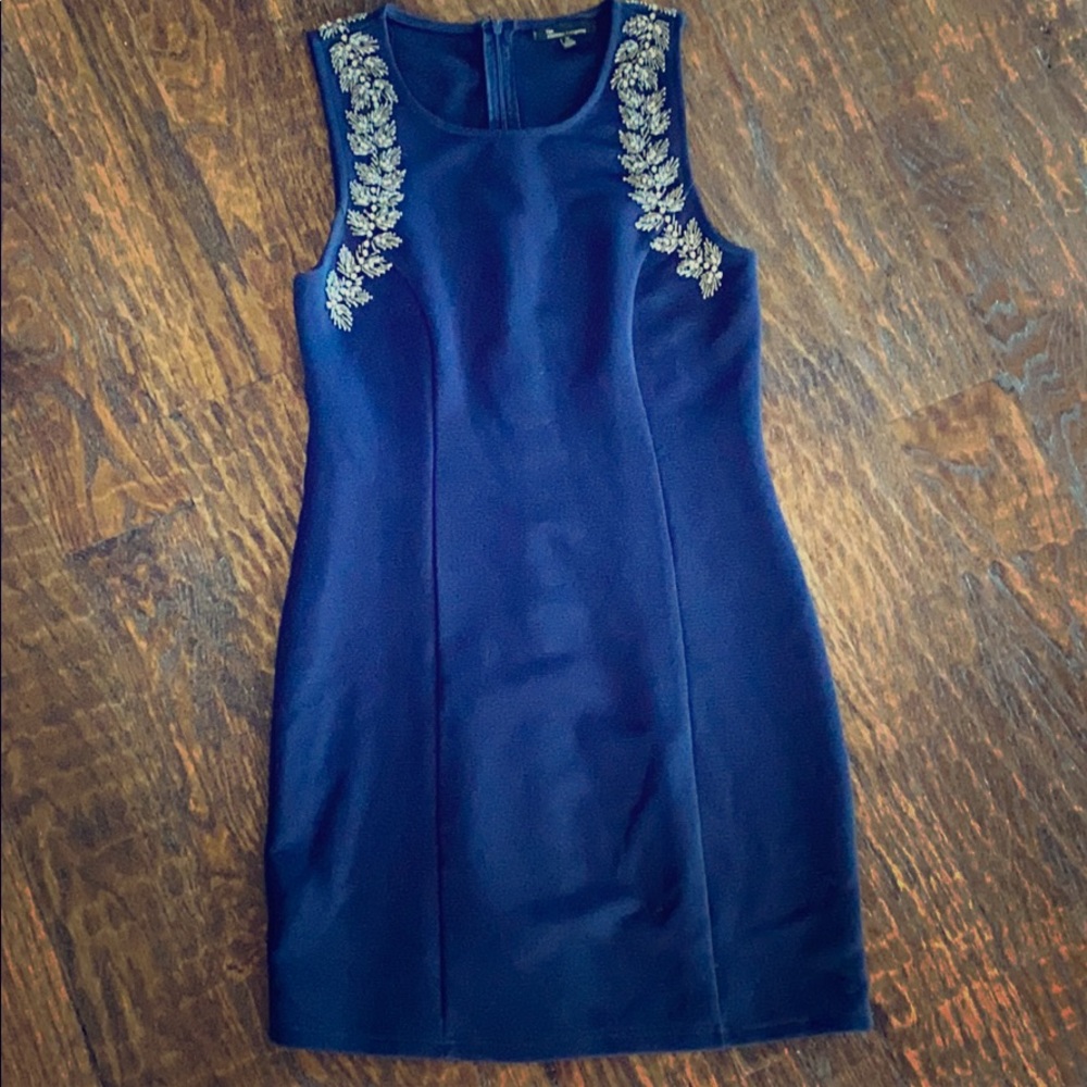 Shoulder beaded mid length, form fitting dress